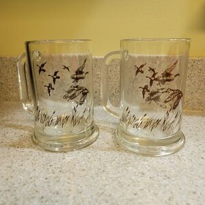 1982 Avon 12 oz Clear Glass Mug Beer Stein Geese Artwork Set Of 2